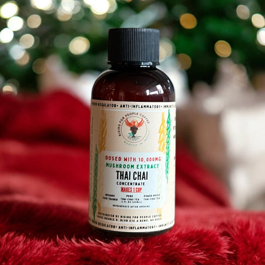 2oz Travel Thai Chai Tea Concentrate - Rising For People Coffee Co.CoffeeRising For People Coffee Co.Rising For People Coffee Co.Rising for People Coffee concentrate bottle— 2oz Travel Happy Mushroom Thai Chai Concentrate Perfect for lattes, baking, cooking, and baking, Latte, Cappuccino, Coffee shop, Coffee shop near, Coffee near me, Roasted coffee, Speciality coffee, Green coffee, Black coffee, Espresso machine, French press, Espresso, Takeout coffee near