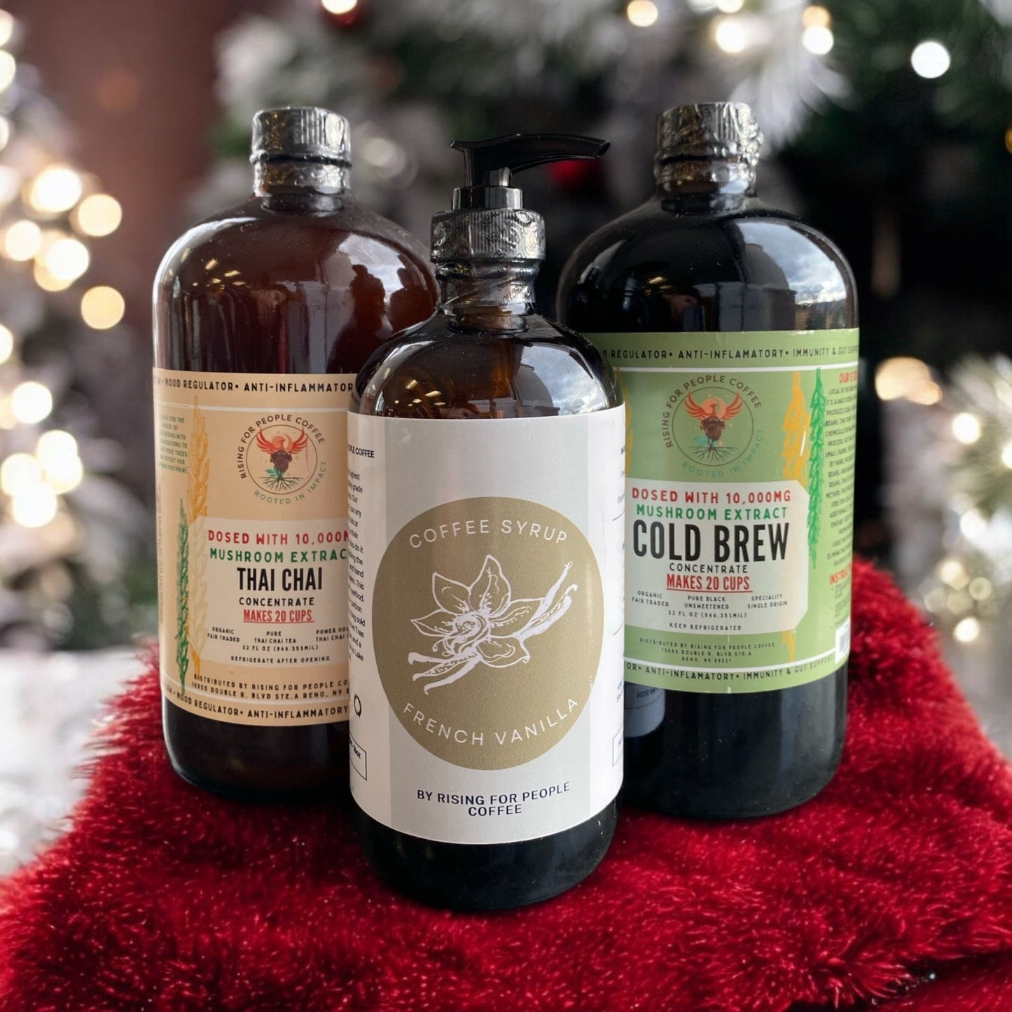 Happy Mushroom Collection & French Vanilla Syrup - Rising For People Coffee Co.CoffeeRising For People Coffee Co.Rising For People Coffee Co.Rising for people coffee— Happy Mushroom Collection: 32oz Happy Mushroom Thai Chai Concentrate, 32oz Happy Mushroom Cold Brew Concentrate, 16oz French Vanilla Syrup, Latte, Cappuccino, Coffee shop, Coffee shop near, Coffee near me, Roasted coffee, Speciality coffee, Green coffee, Black coffee, Espresso machine, French press, Espresso, Takeout coffee near