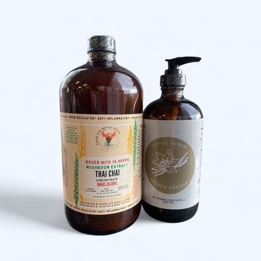 Happy Mushroom Thai Chai & French Vanilla Syrup - Rising For People Coffee Co.CoffeeRising For People Coffee Co.Rising For People Coffee Co.Rising for people coffee— 32oz Happy Mushroom Thai Chai Concentrate and 16oz French Vanilla Syrup Perfect for lattes, baking, cooking, and baking, Latte, Cappuccino, Coffee shop, Coffee shop near, Coffee near me, Roasted coffee, Speciality coffee, Green coffee, Black coffee, Espresso machine, French press, Espresso, Takeout coffee near