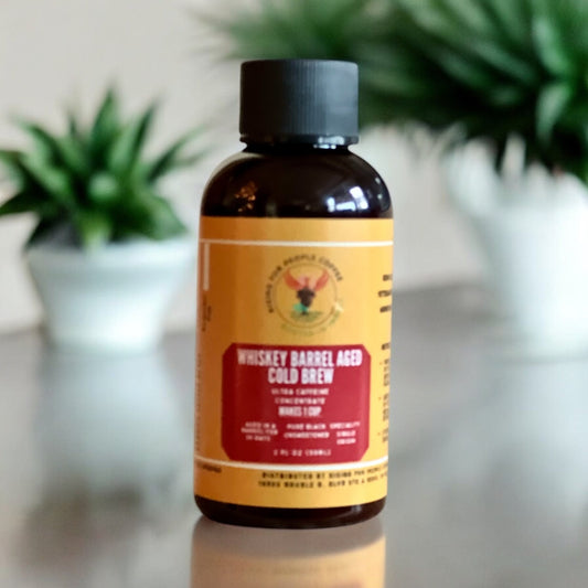 2oz Travel Whiskey barrel cold brew concentrate coffee - Rising For People Coffee Co.CoffeeRising For People Coffee Co.Rising For People Coffee Co.Rising for People Coffee concentrate bottle— 2oz Travel Aged Whiskey Barrel Cold Brew Concentrate