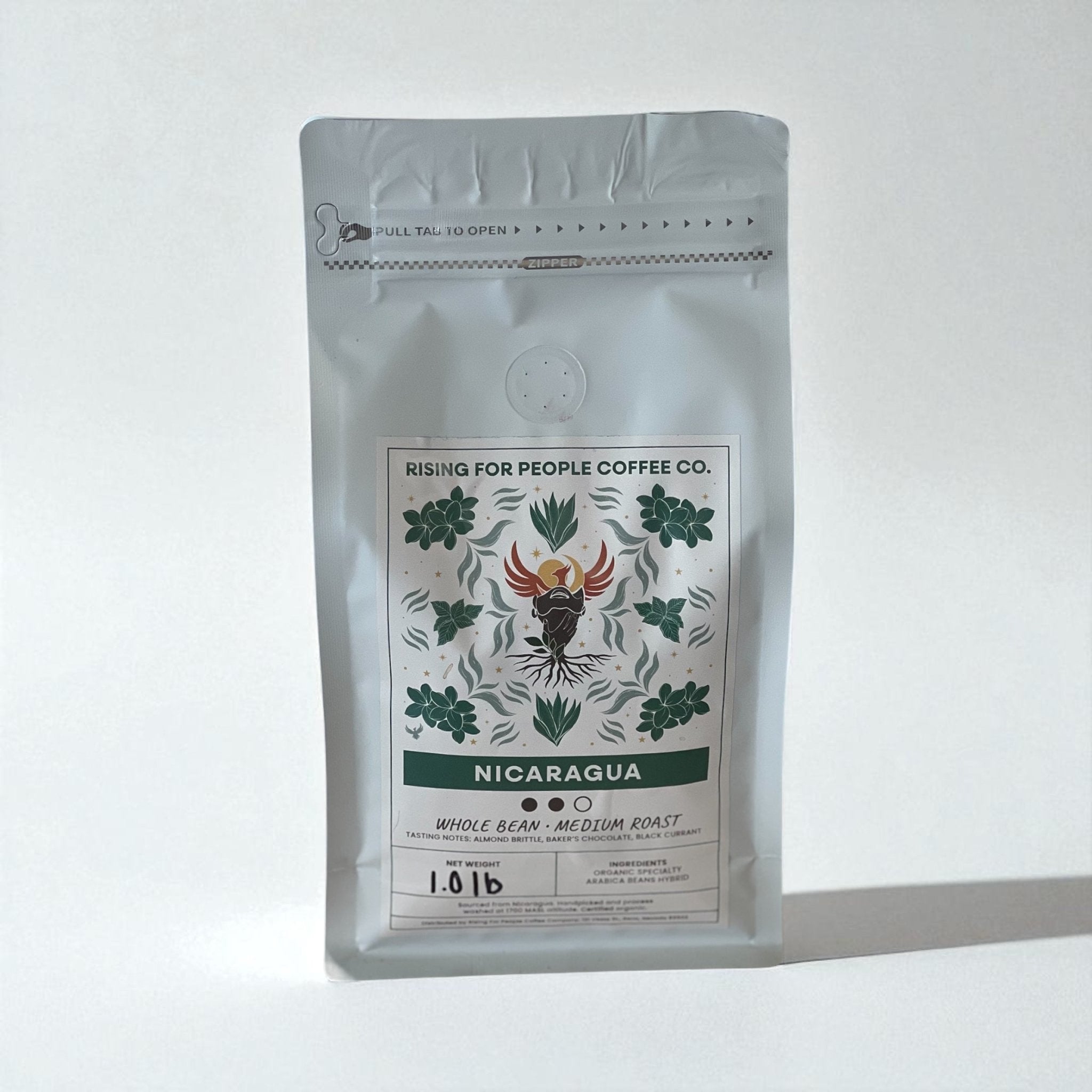 Nicaragua Coffee Roast - Rising For People Coffee Co.CoffeeRising For People Coffee Co.Rising For People Coffee Co.C-NICARAGUA-WH-1LB-KRCoffee package from Rising for People Coffee Co. with 'Nicaragua' label on a white background Nicaragua Coffee Roast - Rising For People Coffee Co.CoffeeRising For People Coffee Co.Rising For People Coffee Co.C - NICARAGUA - WH - 1LB - KRLatte, Cappuccino, Coffee shop, Coffee shop near, Coffee near me, Roasted coffee, Speciality coffee, Green coffee, Black coffe