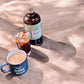 Rising For people coffee cold brew bottle. Specialty gourmet concentrated cold brew dosed with lions mane, Chaga, Cordyceps, turkey tail, Reishi- video