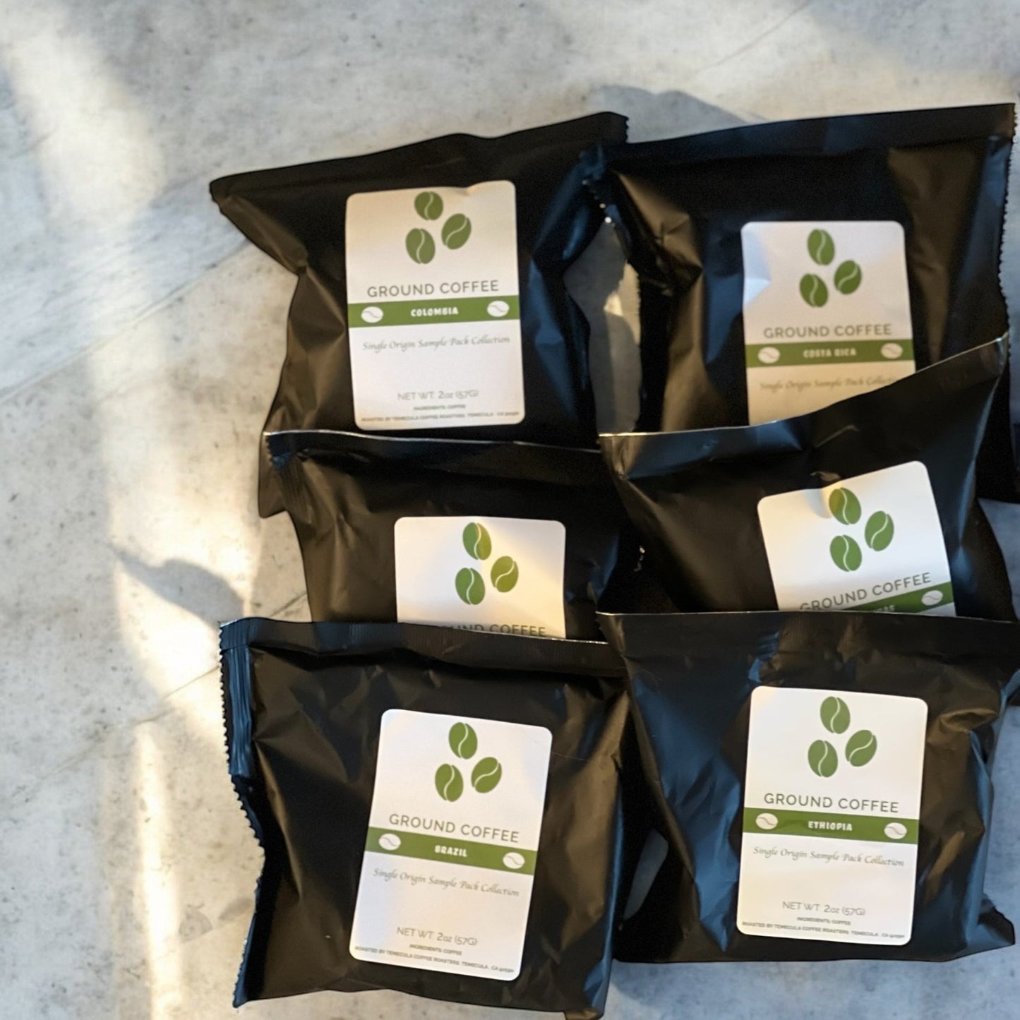 Single Origin Coffee Tasting Experience Kit - Rising For People Coffee Co.CoffeeRising For People Coffee Co.Rising For People Coffee Co.Rising For People Coffee Cupping and tasting Experience - dive into the aroma of coffee ,single origin & specialty gourmet coffee, cupping experience, tasting experience , Marshmallows by sugar love is a perfect coffee pairing, coffee add on, by rising for people coffee, Latte, Cappuccino, Coffee shop, Coffee shop near, Coffee near me, Roasted coffee, Speciality